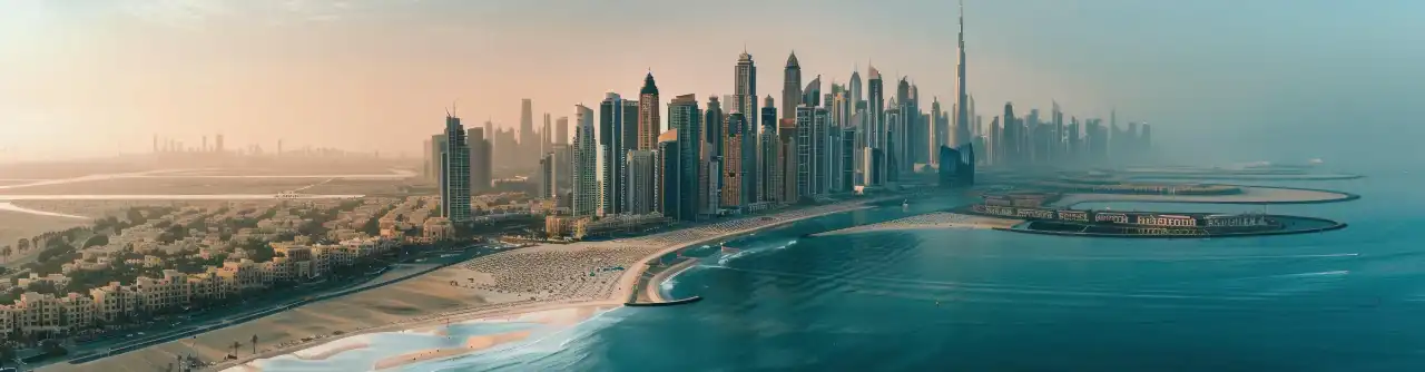 The Dubai coastline at dawn, the Downtown skyline rising behind the beachfront